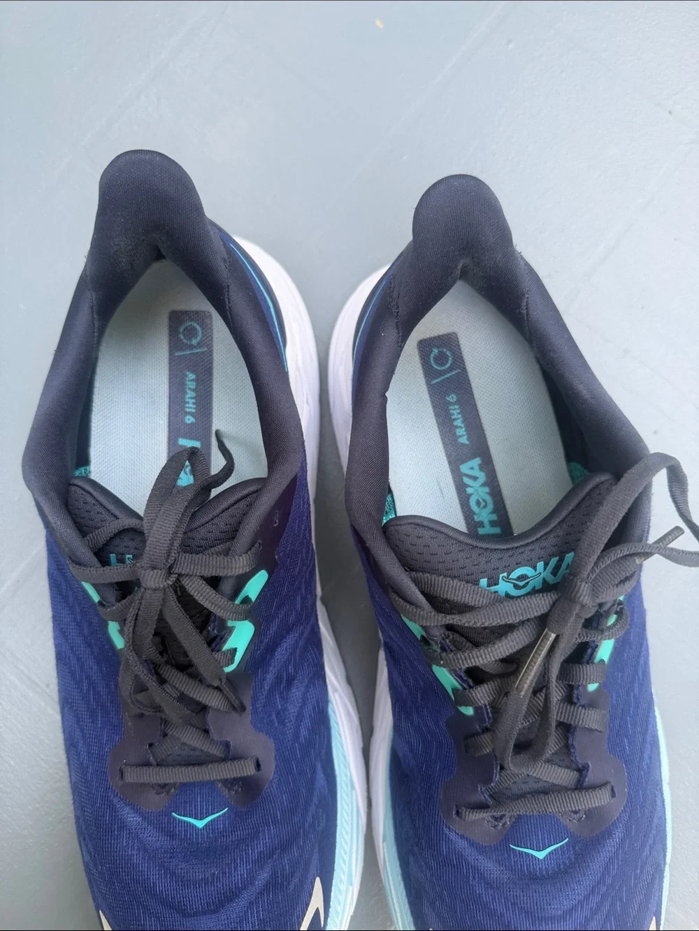 Hoka Navy Running Shoes with Aqua Accents. Wide shoes